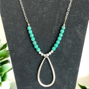 WESTERN NECKLACE WITH SILVERTONE PENDANT AND BLUE BEADS